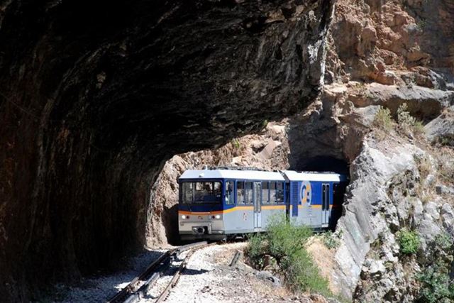 Kalavrita - Odontotos train coming out of a narrow tunnel